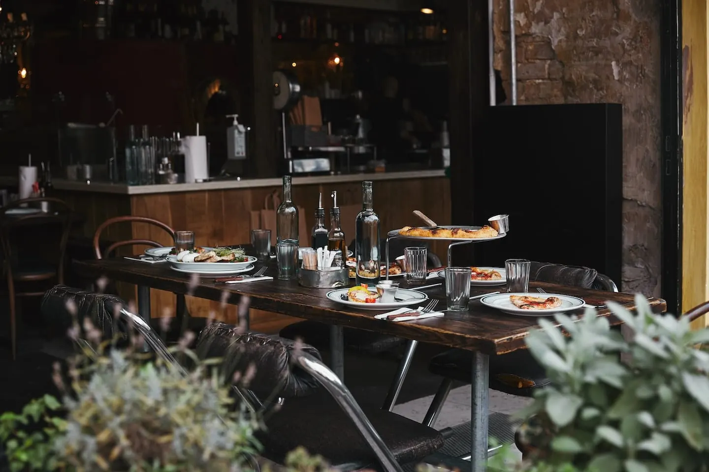 Restaurant dining tables set for service